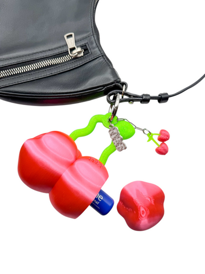 charm cosmic water cereza fucsia