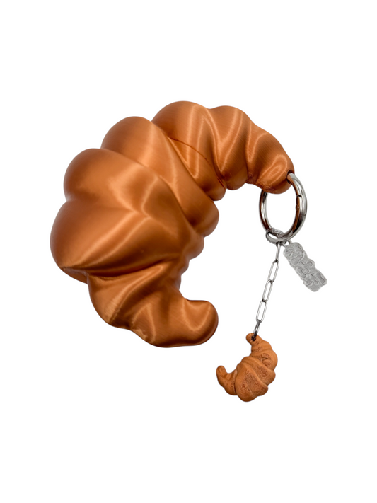 charm cosmic water croissant chocolate