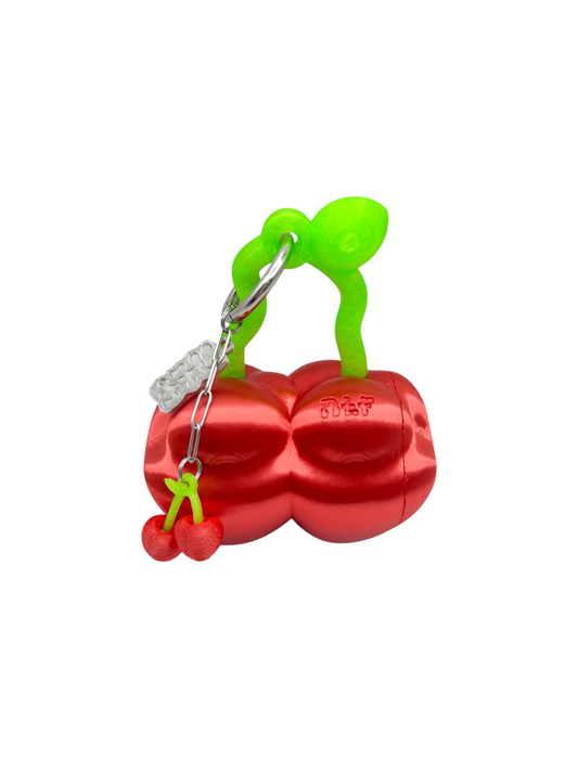 charm cosmic water cereza roja