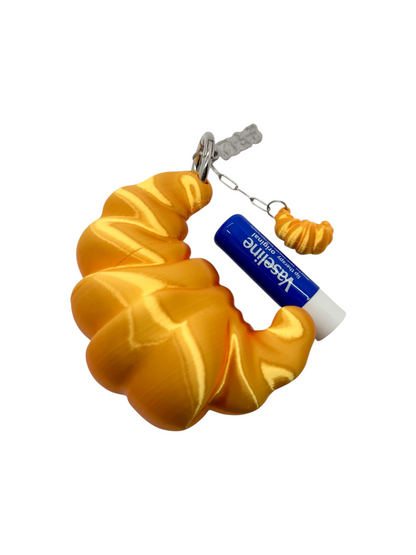 charm cosmic water croissant dorado