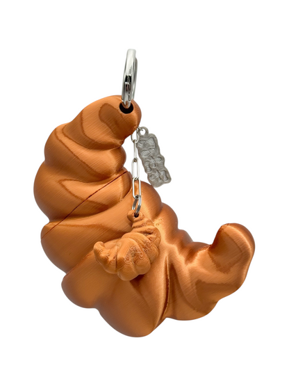 charm cosmic water croissant chocolate